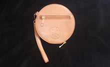 Load image into Gallery viewer, Back view of wallet with debossed logo, zipper pocket, and detachable strap.