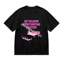 Load image into Gallery viewer, Mock up of ‘Get in loser, we’re fighting fascism’ tee that features a hearse and two skeletons in a pink color scheme.