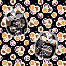 Load image into Gallery viewer, A Halloween-themed pattern of cookies featuring designs of a pumpkin, ghost, and cat on a black background