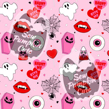 Load image into Gallery viewer, A Valloween-themed pattern of ghosts, haunt me and bite me hearts, coffins, lollipops, eyeballs, spiderwebs, and skelly Cupid corn in a pink, red, black, and white color scheme on a pink background.