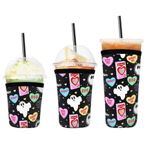 Load image into Gallery viewer, A set of three cup sleeves, in various sizes with the sweetheart ghouls pattern.