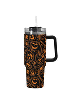 Load image into Gallery viewer, A 40oz stainless steel tumbler with a Halloween-themed pumpkin paisley pattern.