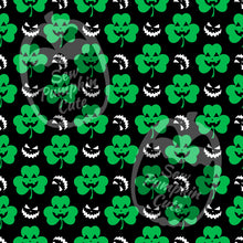 Load image into Gallery viewer, St. Patrick’s day Halloween pattern of green pumpkin shamrocks and white pumpkin faces.