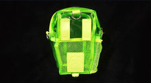 Load image into Gallery viewer, Back view of a translucent green coffin-shaped concert bag
