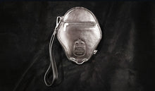 Load image into Gallery viewer, Back view of wallet with zipper pocket, debossed logo, and a detachable strap
