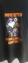 Load image into Gallery viewer, Black t-shirt with Halloween-themed graphics and text on a plain background
