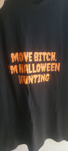 Load image into Gallery viewer, Black tee with the phrase "Move Bitch, I'm Halloween Hunting" in orange text
