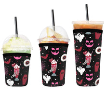 Load image into Gallery viewer, A set of three cup sleeves, in various sizes with the red velvet pattern.
