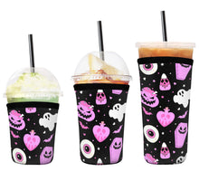 Load image into Gallery viewer, A set of three cup sleeves, in various sizes with the love potion pattern.

