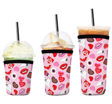 Load image into Gallery viewer, A set of three cup sleeves, in various sizes with the valloween pink pattern.
