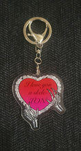 Load image into Gallery viewer, Spooky Valloween keychain with heart and skeleton hands design that reads 'I Love You a Skele-ton'
