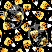 Load image into Gallery viewer, A Halloween-themed cartoonish pattern of candy corn with a skull face on a black background.
