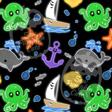 Load image into Gallery viewer, A Halloween color, spooky, underwater-themed cartoonish pattern with green octopuses, grey whales, orange pumpkin star fish, purple anchors, and boats on a black background.
